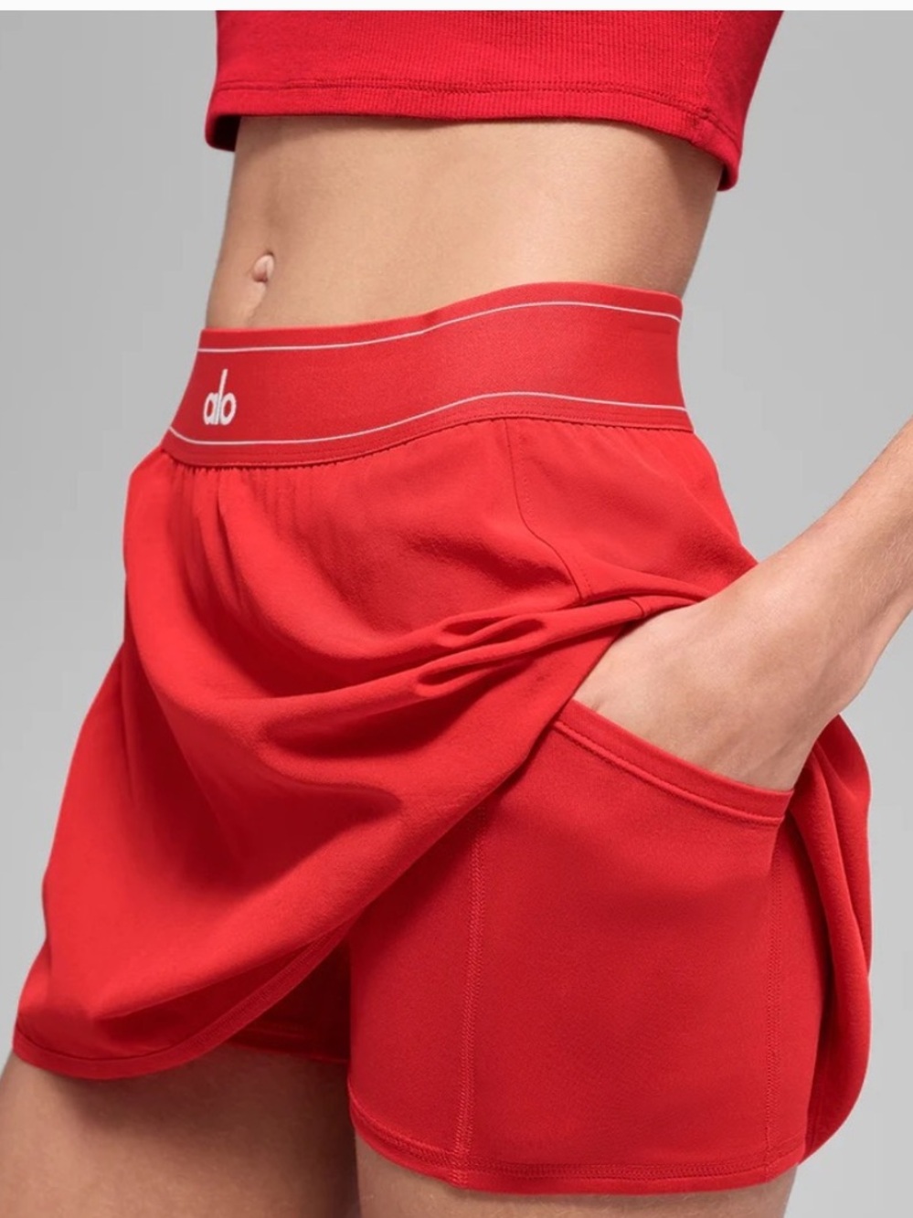 ISO  “bright red” tennis alo skirt